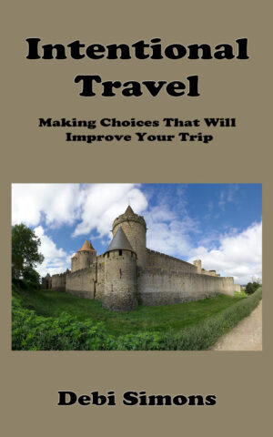 Cover of Intentional Happiness with a castle on a green lawn
